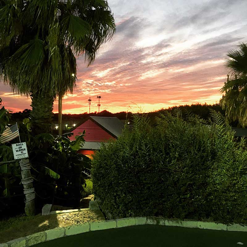sunset over Embassy Mini Golf course